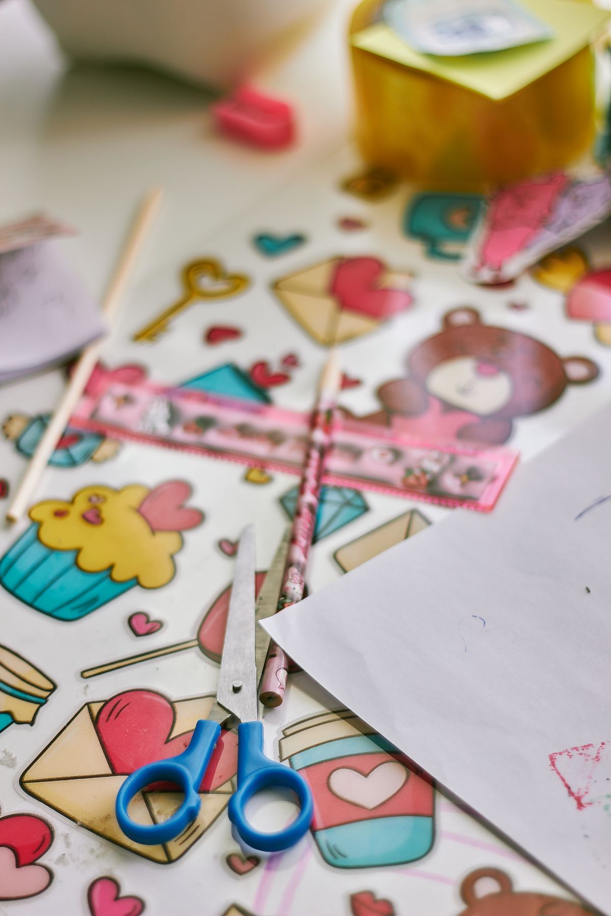 Craft supplies with scissors ruler and paper