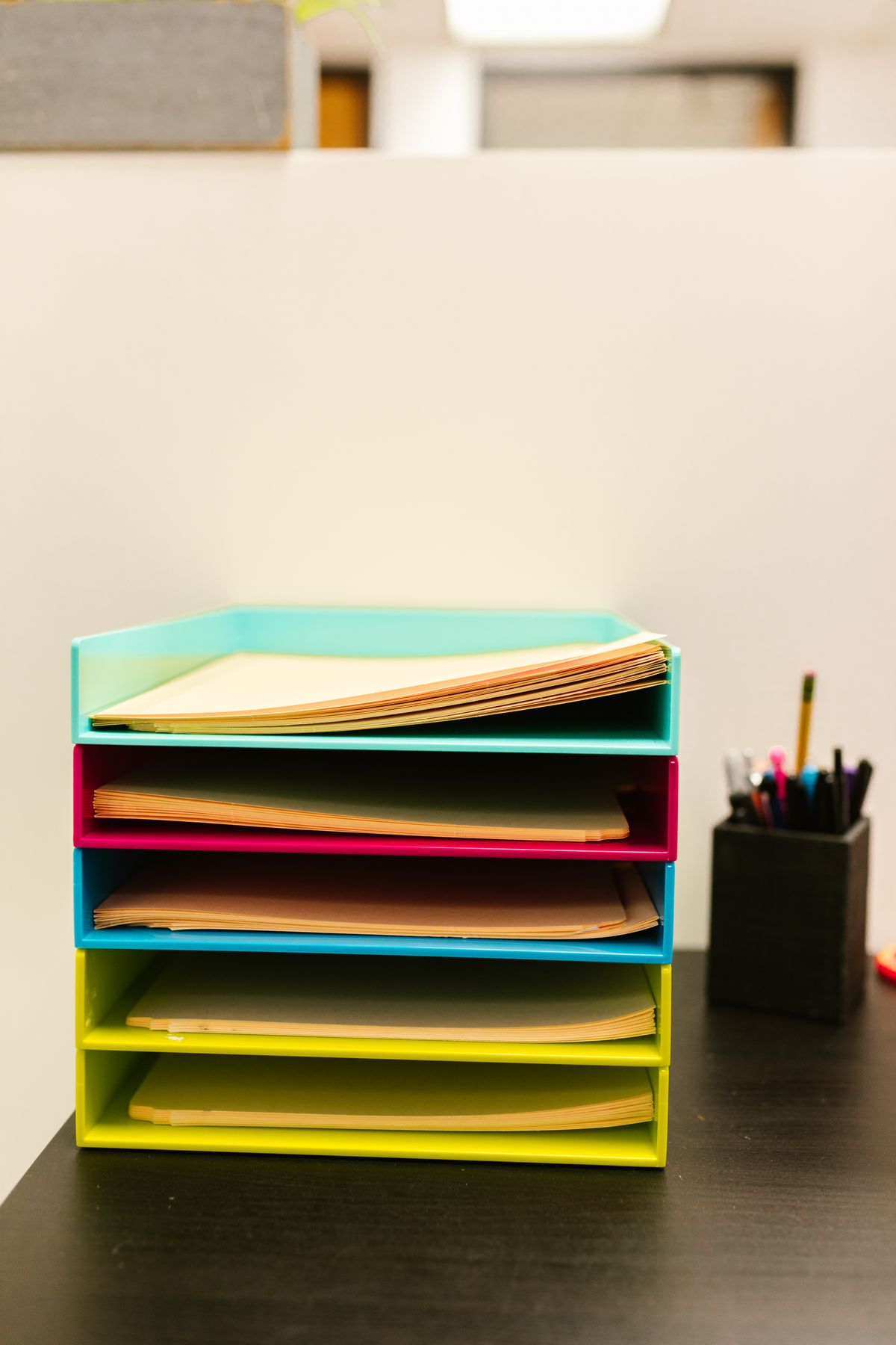 Paperwork stacked in document trays