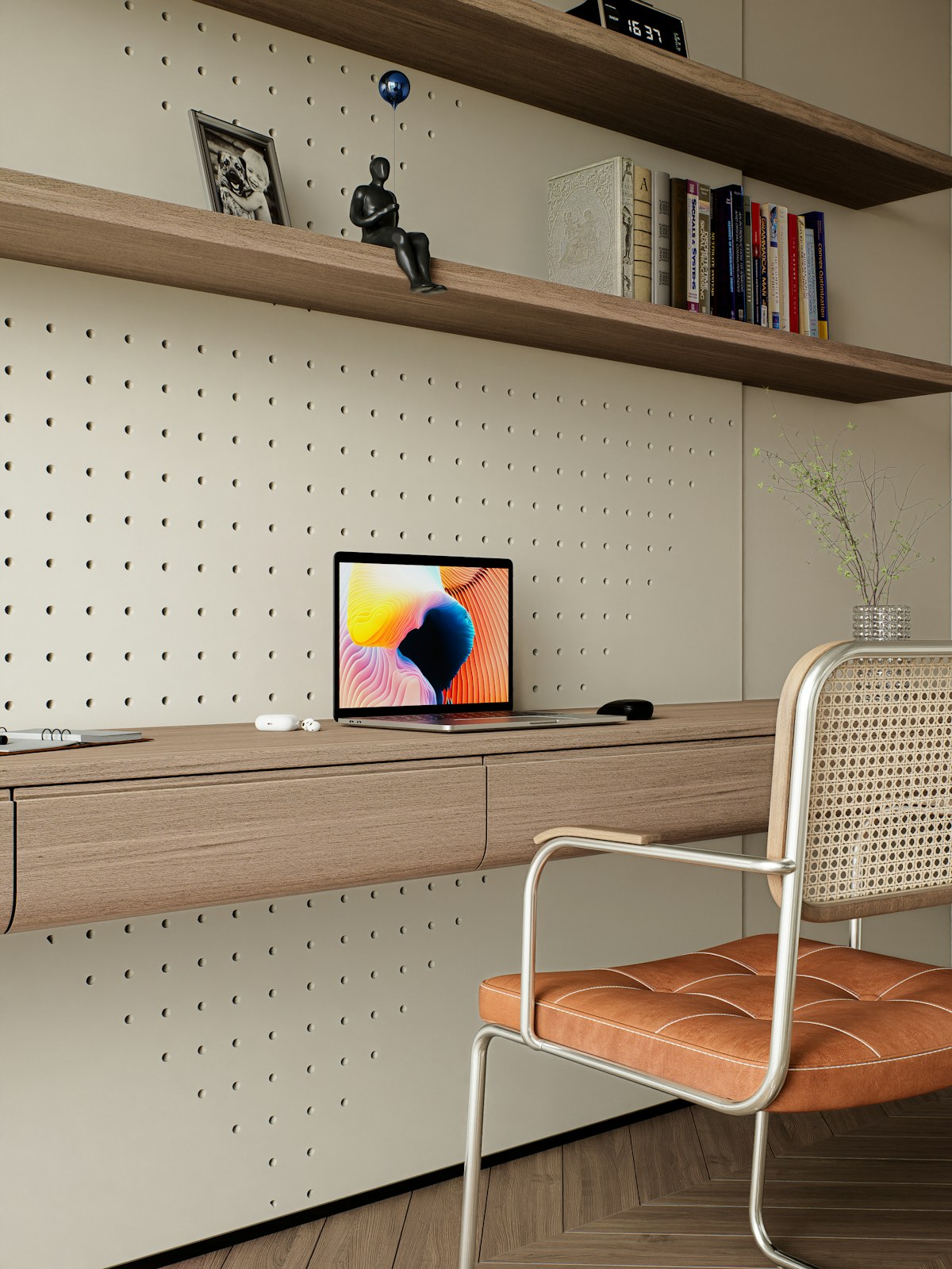 Modern home office with laptop, wooden desk, and stylish chair